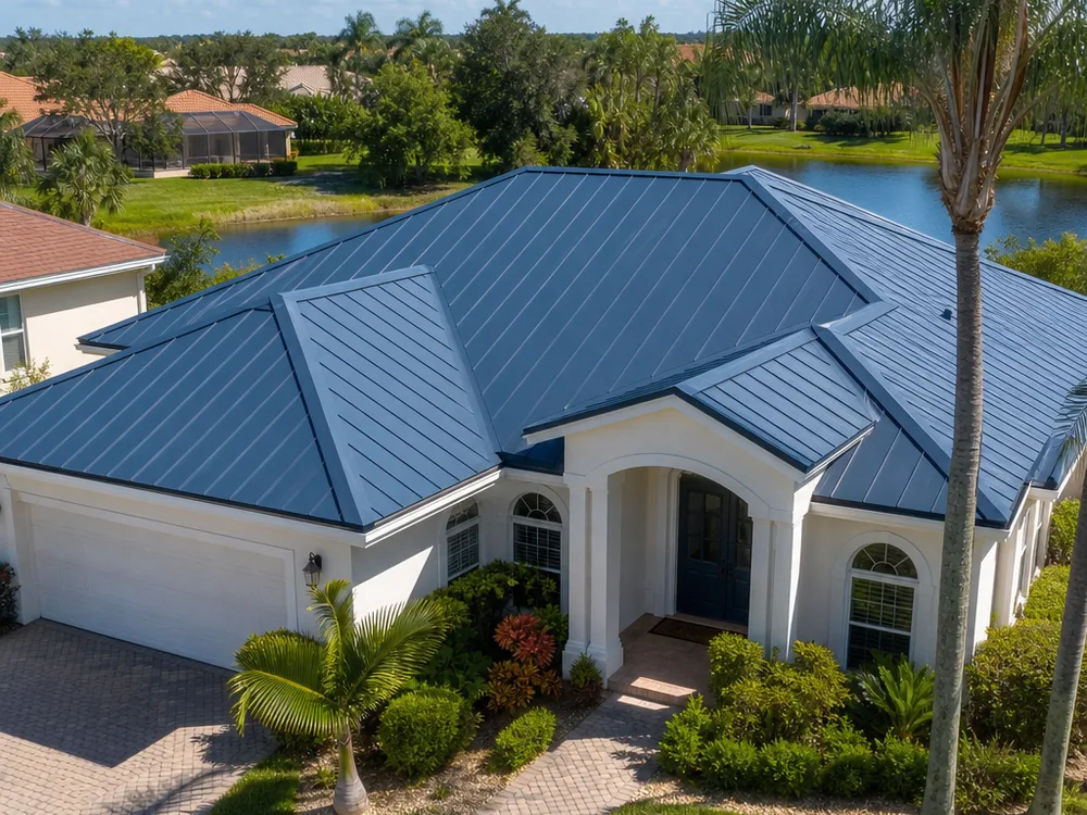 Completed standing seam metal roof on an Orlando home with straight panel lines, clean eave edges, and consistent trim color